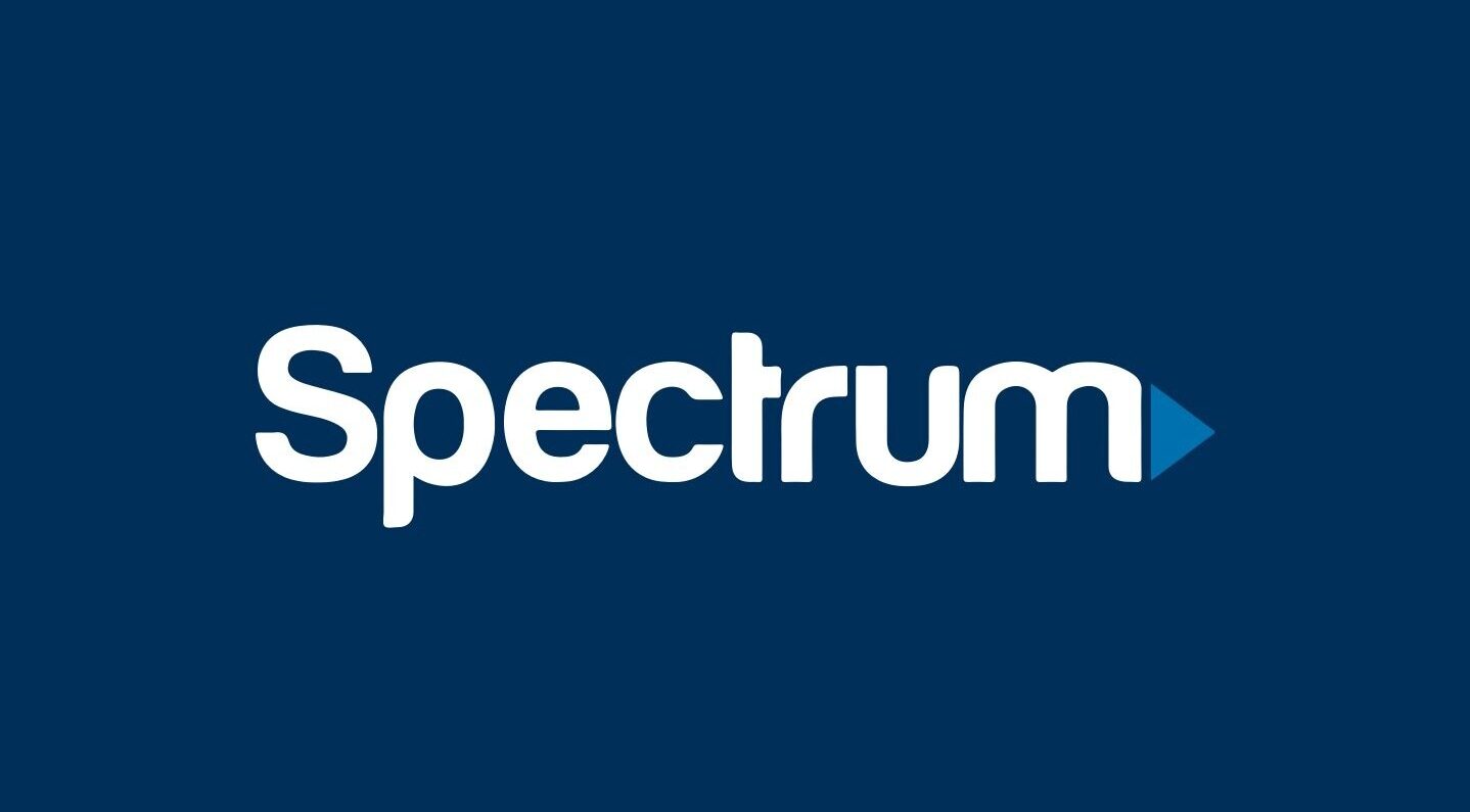 White Spectrum logo on blue background