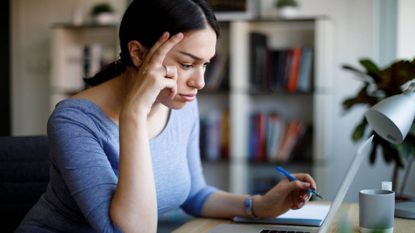 Women looking stressed while on the internet